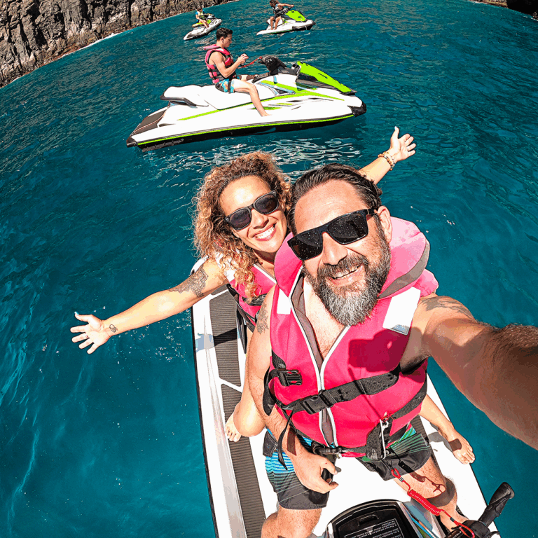 Friends taking a selfie while riding a boat on the water